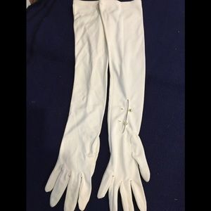 A pair of vintage evening gloves made by Stetson